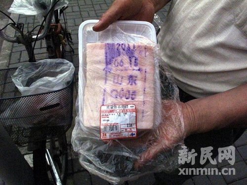 家乐福在售上海爱森猪肉竟盖山东章检疫章(图)