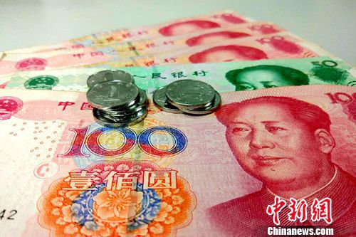 多地提高最低工资。(资料图)<a target='_blank' href='http://www.chinanews.com/' _cke_saved_href='http://www.chinanews.com/' _fcksavedurl='http://www.chinanews.com/' ></table>中新网</a>记者 李金磊 摄